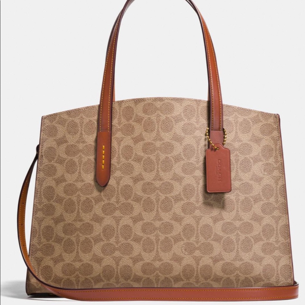 Coach Charlie Carryall In Signature Canvas